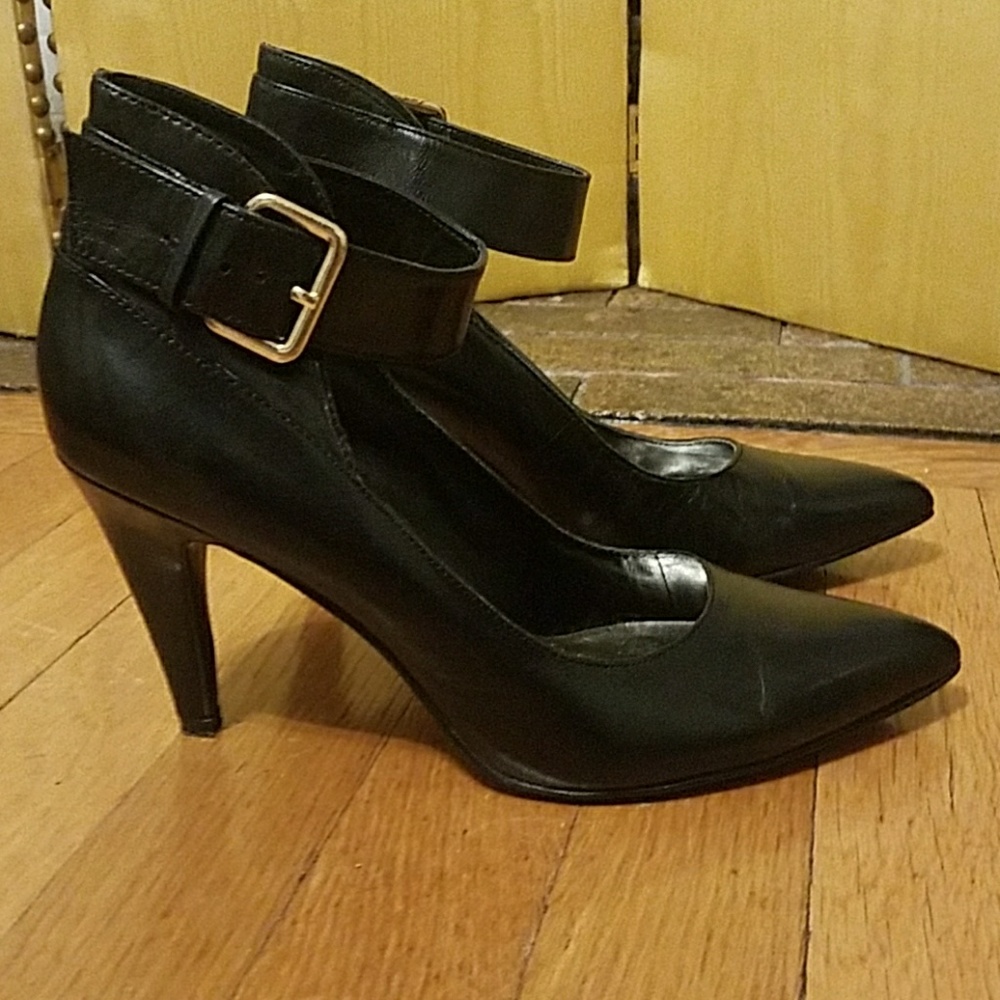 Black Nine West ankle strap heels.